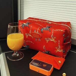 Playful Orange Printed Pouch